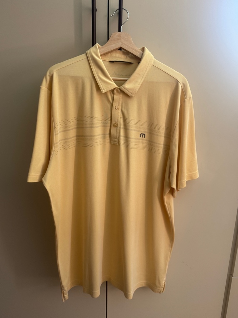 Travis Mathew Pale Yellow Men's Polo with Subtle Chest Stripes